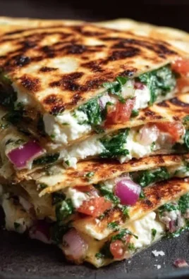 Mediterranean Quesadillas with Spinach, Feta, Mozzarella, and Red Onion