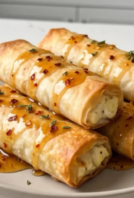 Indulgent Oven Fried Feta Rolls with Chili Honey Magic